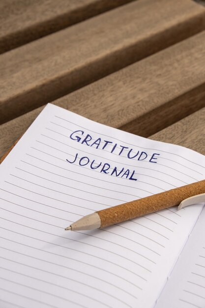 Photo writing gratitude journal on wooden bench today i am grateful for self discovery journal self