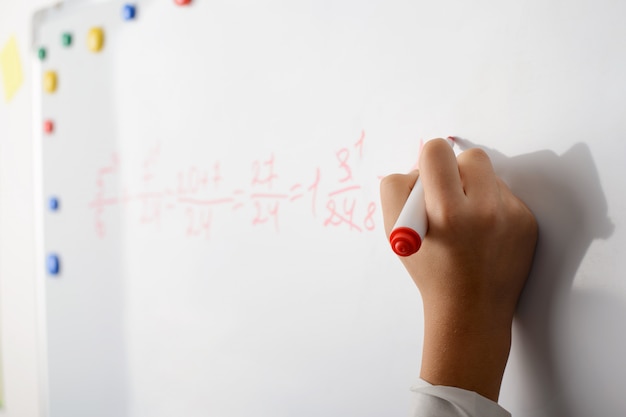 Photo writing math exercises on a board