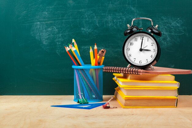 Writing utensils and alarm clock