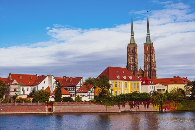 Wroclaw autumn cityscape historic old town by odra river view at tumski island and cathedral of st john the baptist