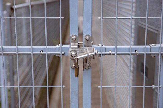 Photo wrought iron fencing and key lock gates