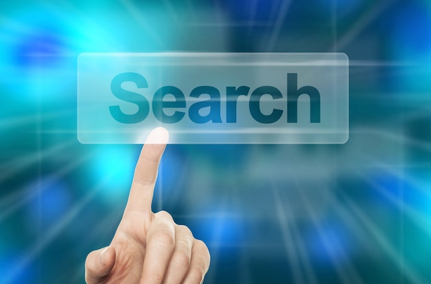 WWW Searching Concept. Hand Pressing Search Button in Virtual Web Browser on Blue Background