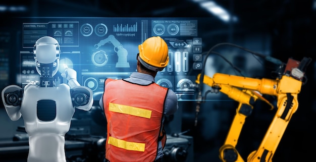 XAI Gemechaniseerde industriële robot en menselijke werknemer werken samen in de fabriek van de toekomst