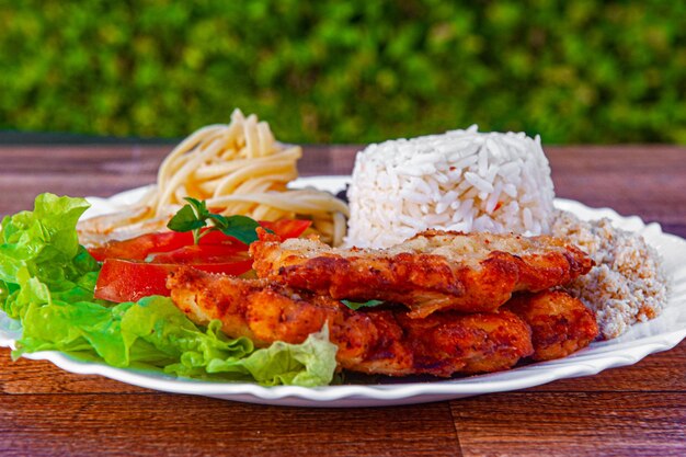 Xatrade of lunchboxes with typical brazilian flavor and the\
basis of brazilian food rice and beans