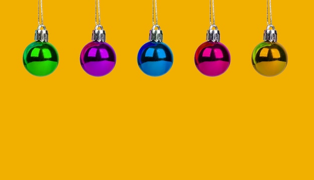 Photo xmas balls banner christmas background with holiday ornaments balls