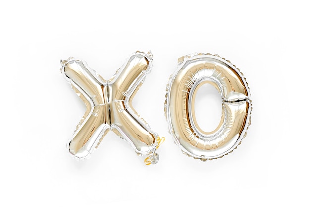 XO foil balloon letters. Love concept. Holiday and celebration. Valentine's Day or wedding/bachelorette party decoration. Silver Metallic  air balloons.