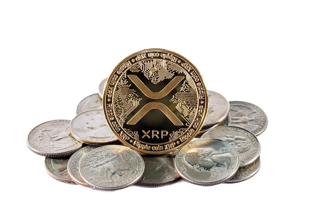 Photo xrp ripple cryptocurrency golden coin with us dollar coins