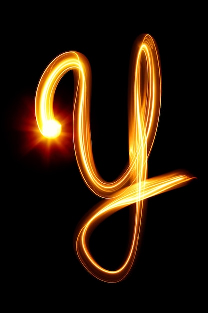 Y - Created by light alphabet over black background