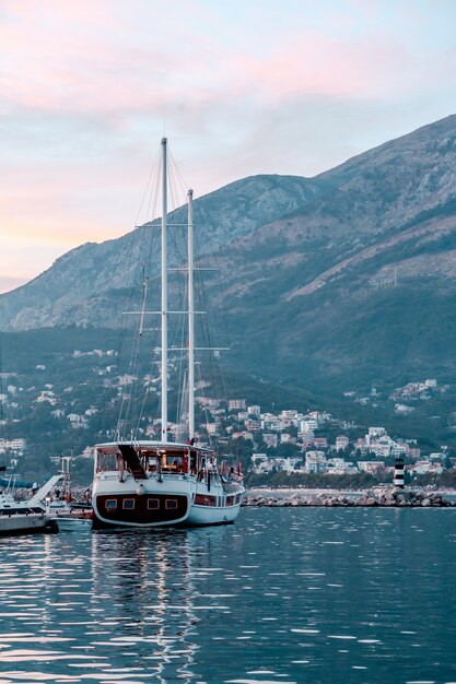 Yacht bay on amazing backgrount with city and mountains