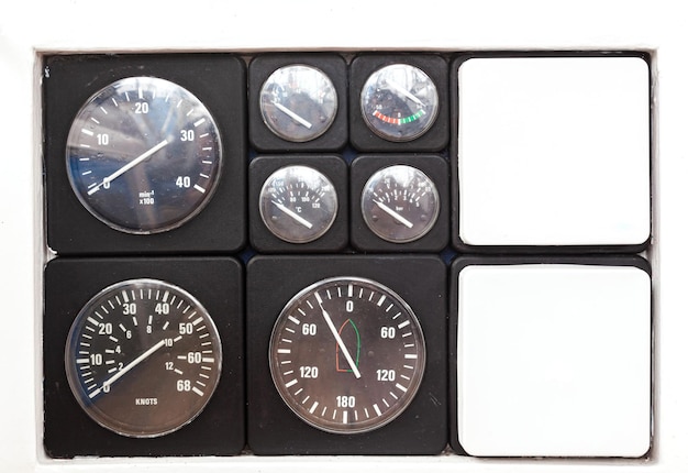 Yacht dashboard with speed temperature vessel roll and pressure gauges