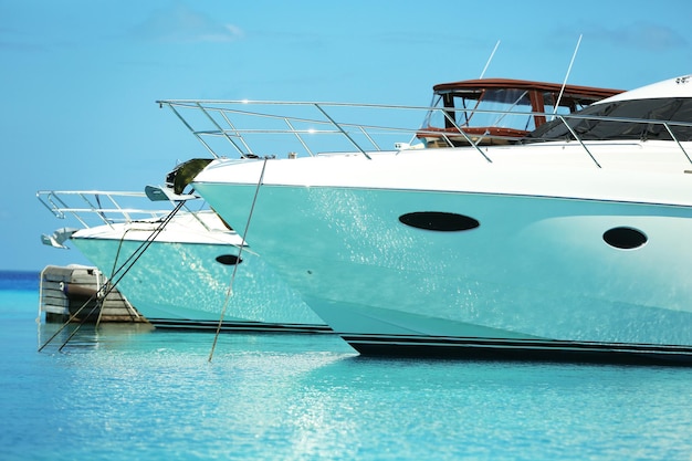 Yacht parked at jetty in Baros Maldives