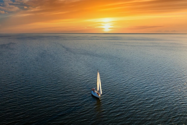 Yacht sailing at sunset Luxury vacation at sea