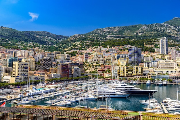 Yachts in bay near houses and hotels La Condamine MonteCarlo Monaco Cote d'Azur French Riviera