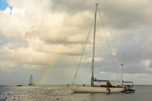 Yachts at Rodney bay with rainbow in the backround Saint Lucia Caribbean sea