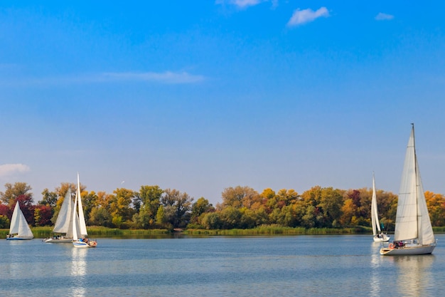 Yachts at sailing regatta on the Dnieper river in Kremenchug Ukraine