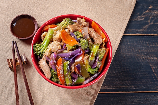 Yakisoba, famous Japanese fried noodles, with meat and vegetables.