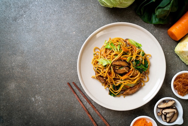 yakisoba noodles stir-fried with vegetable in asian style - vegan and vegetarian food