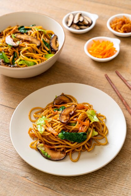 yakisoba noodles stir-fried with vegetable in asian style - vegan and vegetarian food