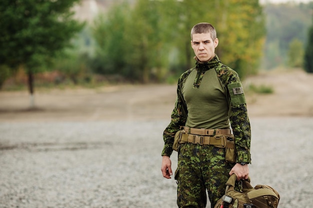 Yang soldier holding their equipment