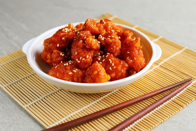 Yangnyeom chicken is a fried chicken dish prepared in a Korean style