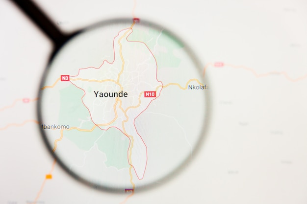 Yaounde, cameroon city visualization illustrative concept on\
display screen through magnifying glass