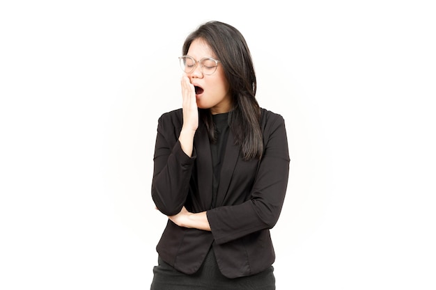 Yawning Gesture Of Beautiful Asian Woman Wearing Black Blazer Isolated On White Background