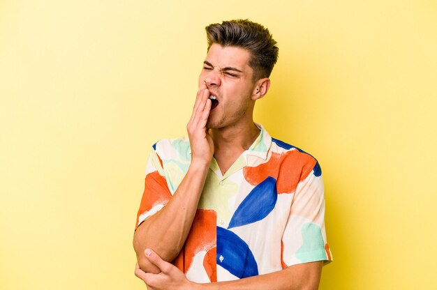 Yawning showing a tired gesture covering mouth with hand