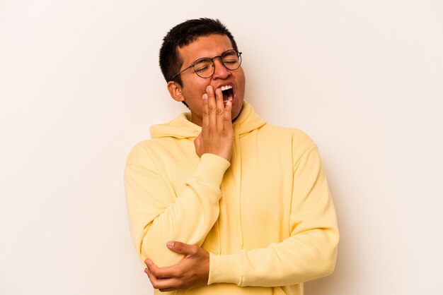 Yawning showing a tired gesture covering mouth with hand