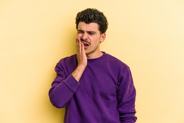 Yawning showing a tired gesture covering mouth with hand