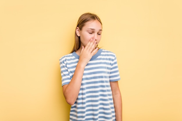 Yawning showing a tired gesture covering mouth with hand