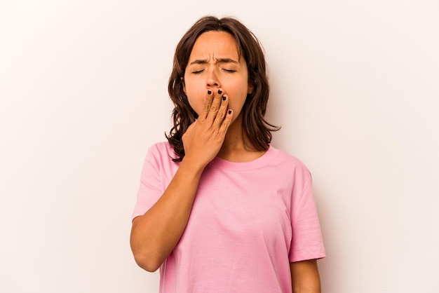 Yawning showing a tired gesture covering mouth with hand