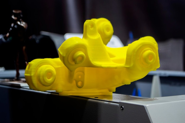 Yellow abstract d printed model closeup objects printed on d printer from plastic closeup d printed