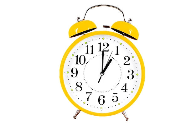 Yellow alarm clock isolated on the white background