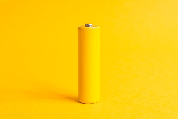 Yellow alkaine Power battery on yellow background