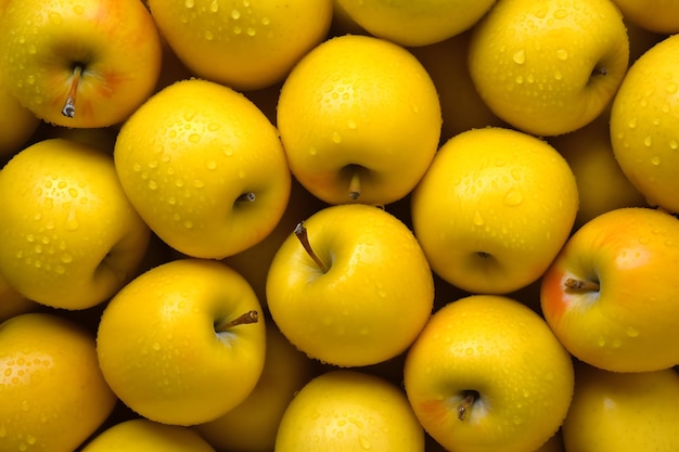 写真 yellow apples background with water drops