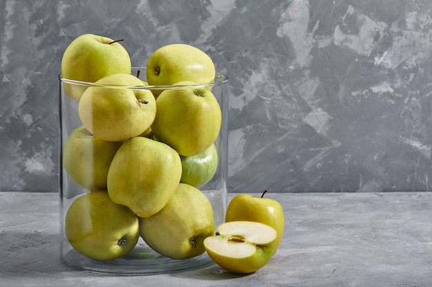 Yellow apples on the table