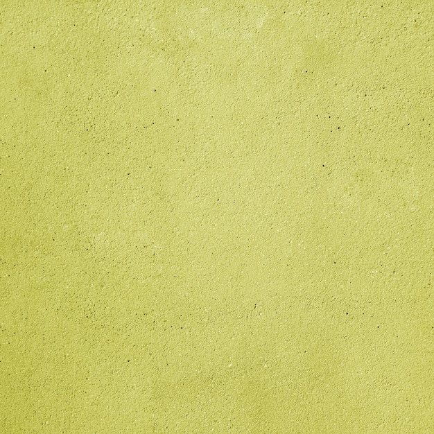 Yellow background with concrete wall effect