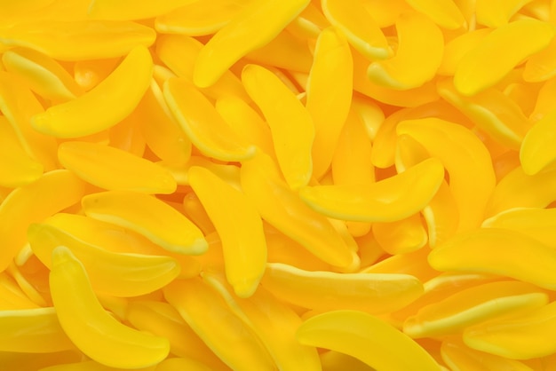 Yellow banana gummy candies. Top view. Jelly  sweets.