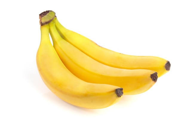 Yellow bananas isolated on white surface