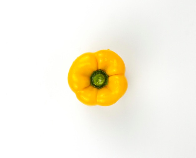 A yellow bell pepper isolated on white background