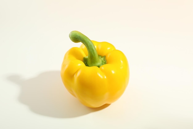 Yellow bell pepper on white background close up
