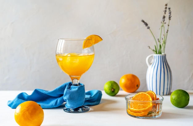 Yellow bird cocktail with rum orange and lime juice ice