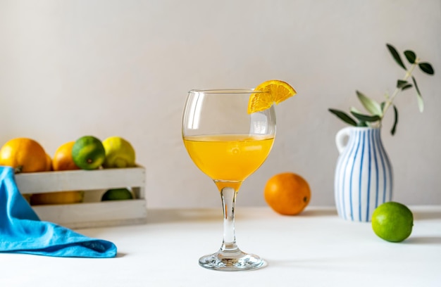 Yellow bird cocktail with rum orange and lime juice ice