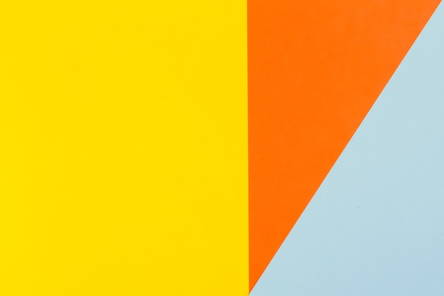 Yellow blue and orange color paper background