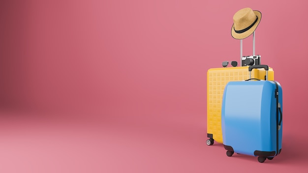 Yellow and blue suitcase with sun hat and glasses, camera, travel concept