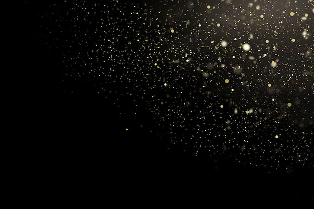 yellow blurred glitter on dark background