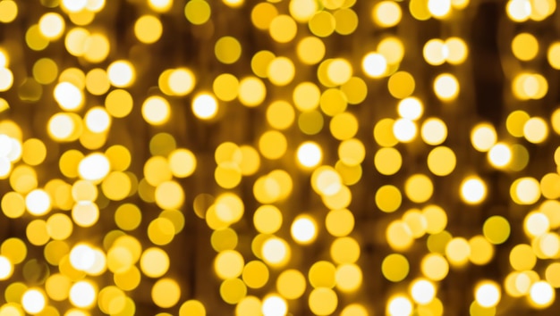 The yellow bokeh brings a sense of coziness to the festive atmosphere