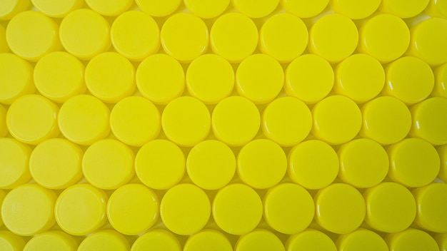 The yellow Bottle  plastic cap background