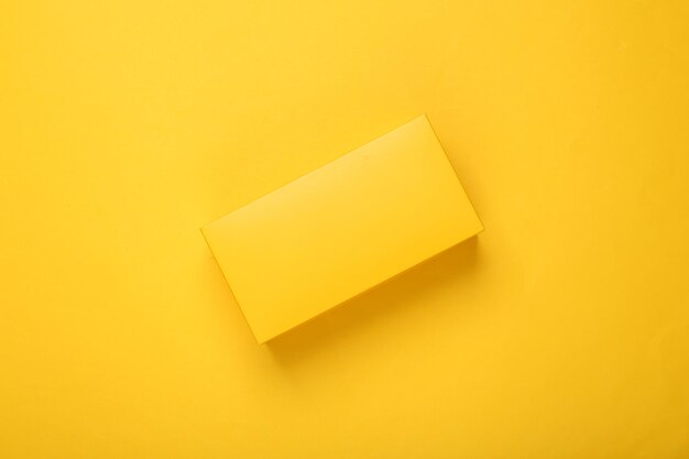 Yellow box mockup on yellow background