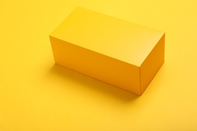 Yellow box mockup on yellow background